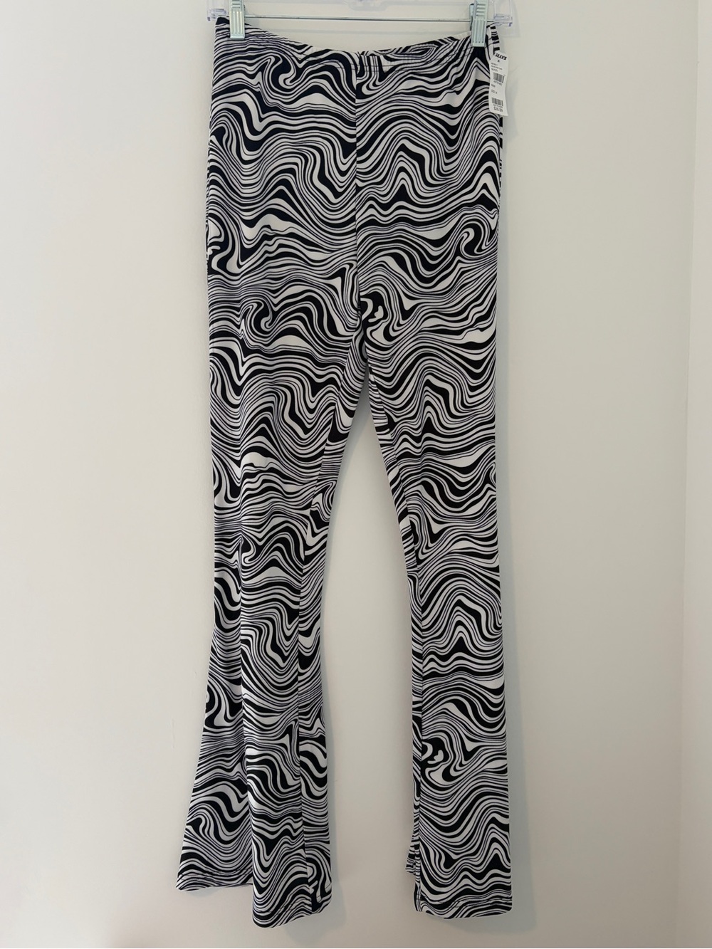 Tilly's Black & White Swirl Flare Leggings